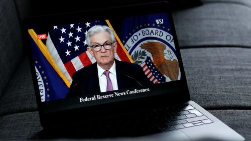 Bitcoin Rises as Fed Holds Rates Steady